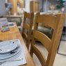Tenby Oak Cross Leg Dining & 6 Ladder Back Chairs with Cushions